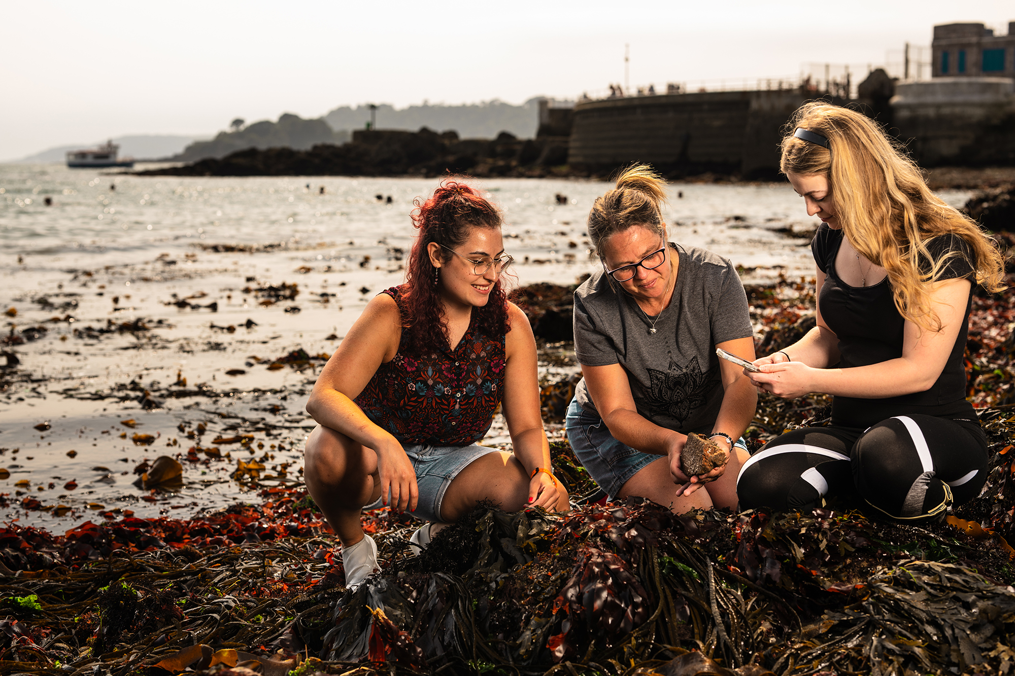 Members of the OBIS UK team during a rock pool survey.
